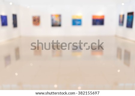 Blur image of the lobby of a modern art center as background with bokeh