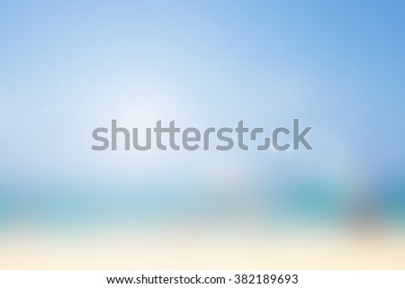 blurred background of sea with lens flare lights