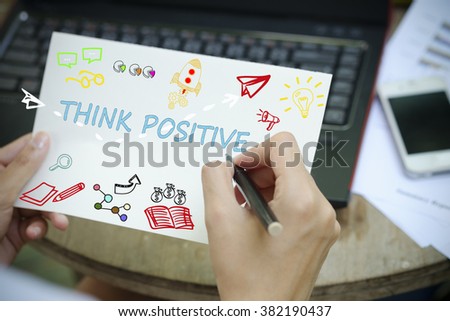 hand drawing THINK POSITIVE concept on white notebook , business concept , business idea