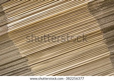 stack of brown cardboard sheets on background
