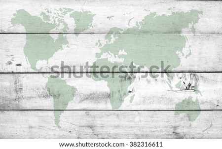 Dirty white plank wood  wall and world map green color tone  on wall texture background. abstract wall paper design