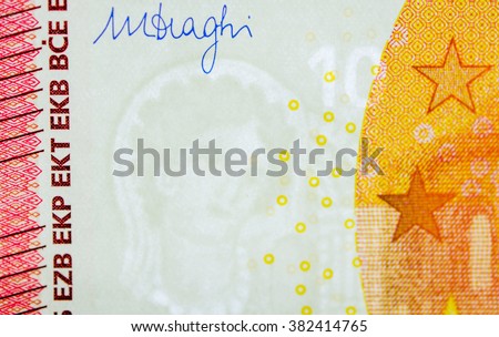 Ten Euro paper currency detail with the right corner including Mario Draghi governor signature and European central Bank protection mark as wel as the protection watermark with Europe head