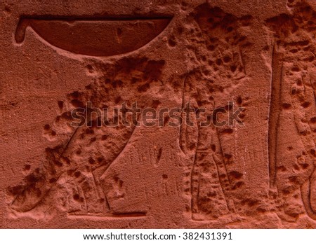 Well preserved authentic real Egyptian hieroglyphs on the wall in a temple