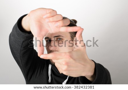 man making frame hand