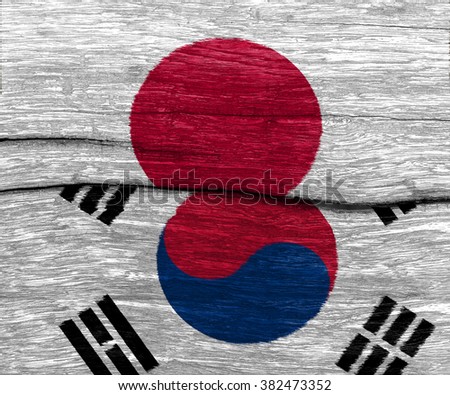 japan and south korea flag on old wood texture pattern background