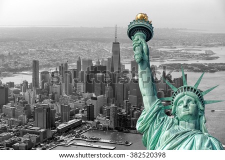Statue of liberty on new york cityscape