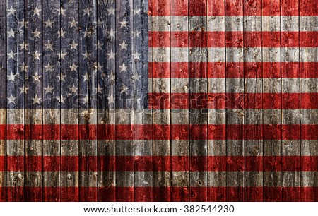 American flag painted on old wood plank background