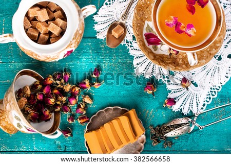 Tea in oriental style on a blue wooden background