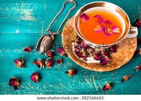 Tea in oriental style on a blue wooden background