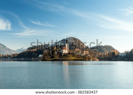 Reflections on the lake of Bled in a cold autumn morning