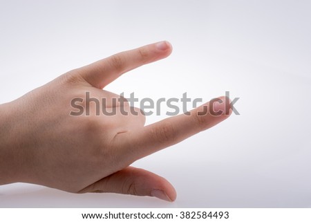 Hand of a rocker on a white background