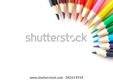 Background from circle of colour pencils in the upper right corner