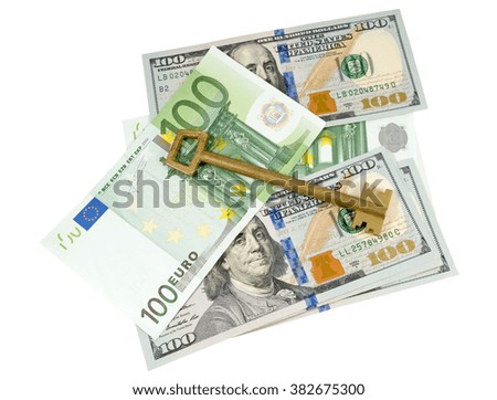 Euro banknotes, dollars and key on a white background