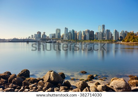 Vancouver downtown with urban buildings at waterfront.