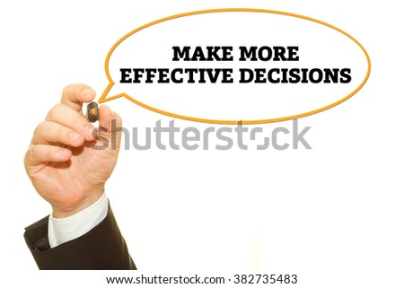 Businessman hand writing Make More Effective Decisions on a transparent wipe board.