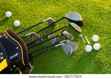 Golf club in bag on grass Royalty-Free Stock Photo #382777819