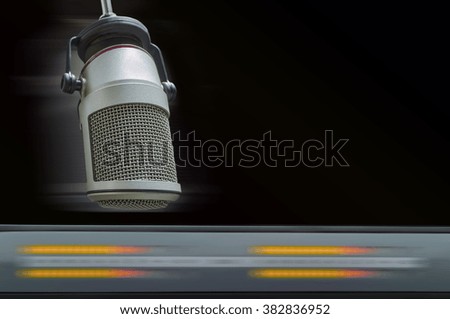 microphone and audio console in a radio studio