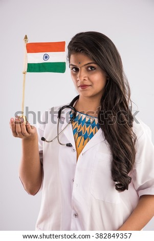 Female doctor with indian flag or tri colour, showing patriotism, isolated on white