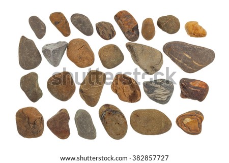 collection of ocean stones close-up isolated on white background.