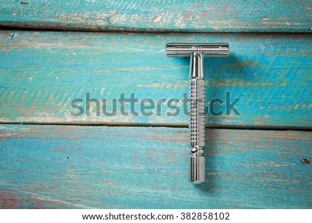 Mens grooming tools on a blue background
