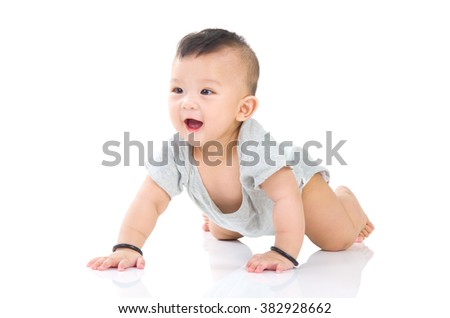 crawling beautiful baby boy Royalty-Free Stock Photo #382928662