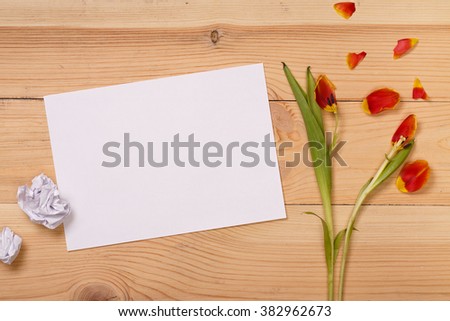 Post blog social media 8 march. View from above with copy space. Banner template layout mockup for woman day. White wooden table, top view on workplace. Lilac tulips at the Desk. Greeting Cards.