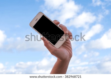 Hand holding a smartphone