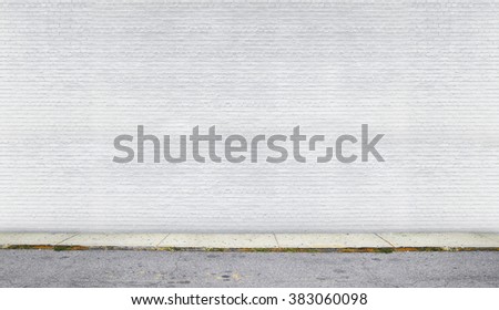 Painted on white and clear brick wall on the street Royalty-Free Stock Photo #383060098