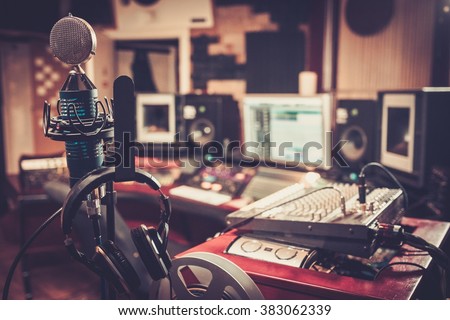 Close-up of boutique recording studio control desk. Royalty-Free Stock Photo #383062339