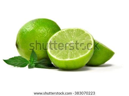Fresh limes and mint leaves, isolated on white