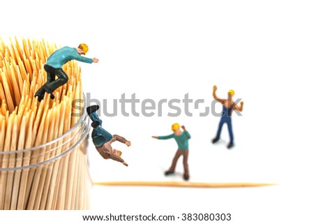 selective focus of miniature fall down from toothpick case, abstract background for safety first concept. 