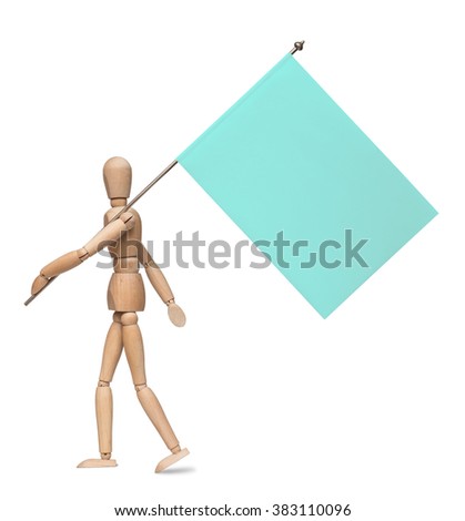 The wooden lay figure marches with a flag on an iron spike. Isolated on white background.