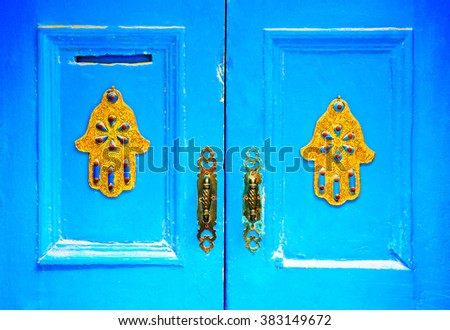 The doors made of wood painted blue. Decoration concept