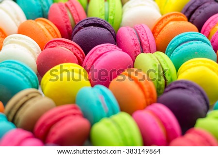 A french sweet delicacy, colourful macaroons variety closeup.Background Texture, Royalty-Free Stock Photo #383149864