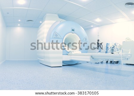 MRI (nuclear magnetic resonance imaging) laboratory with high technology contemporary equipment Royalty-Free Stock Photo #383170105