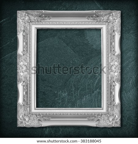 gray frame on black slate background