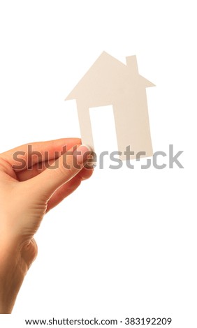 Women hand holding paper house