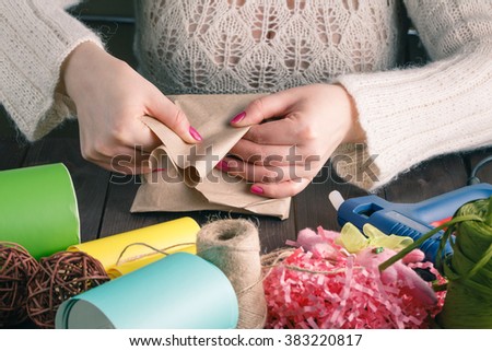 Woman make gift. Leisure hobby concept