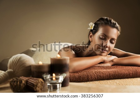 The girl relaxes in the spa salon Royalty-Free Stock Photo #383256307