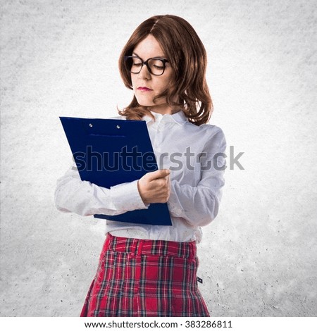 Student girl holding school notes
