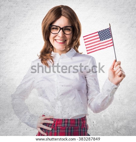 Student girl holding an american flag