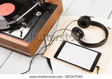 Tablet pc, headphones and turntable