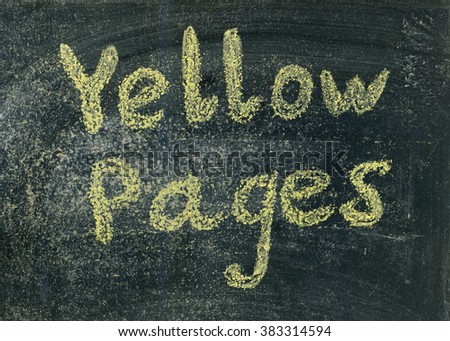Yellow pages chalk sign on a blackboard