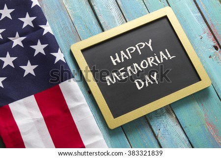 Memorial Day chalk sign on blue wood background