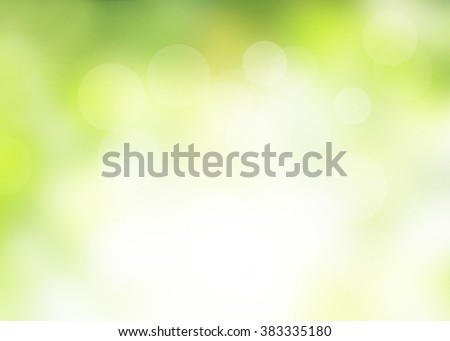 nature blur greenery bokeh leaf wallpaper; spring and autumn park background; Soft focus light on view leaves flare medical rays abstract pastel tree foliage forest landscape gradient white and yellow Royalty-Free Stock Photo #383335180