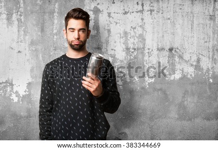 young man drinking beer