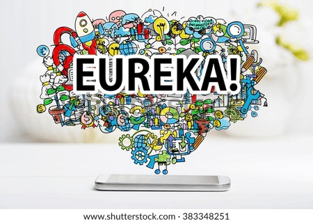 Eureka concept with smartphone on white table
