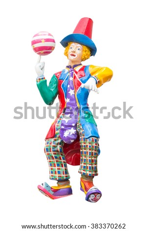 Clown statue spinning ball isolated on white background with clipping path