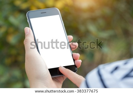 close up hand using phone white screen Royalty-Free Stock Photo #383377675