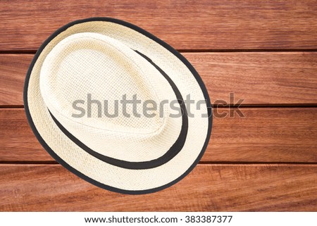 Men's accessories with vintage hat on wooden background